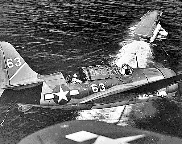 xx SB2C-1C_Helldivers_of_VB-1_fly_over_USS_Yorktown_(CV-10)in_July_1944(80-G-376123)_R-1